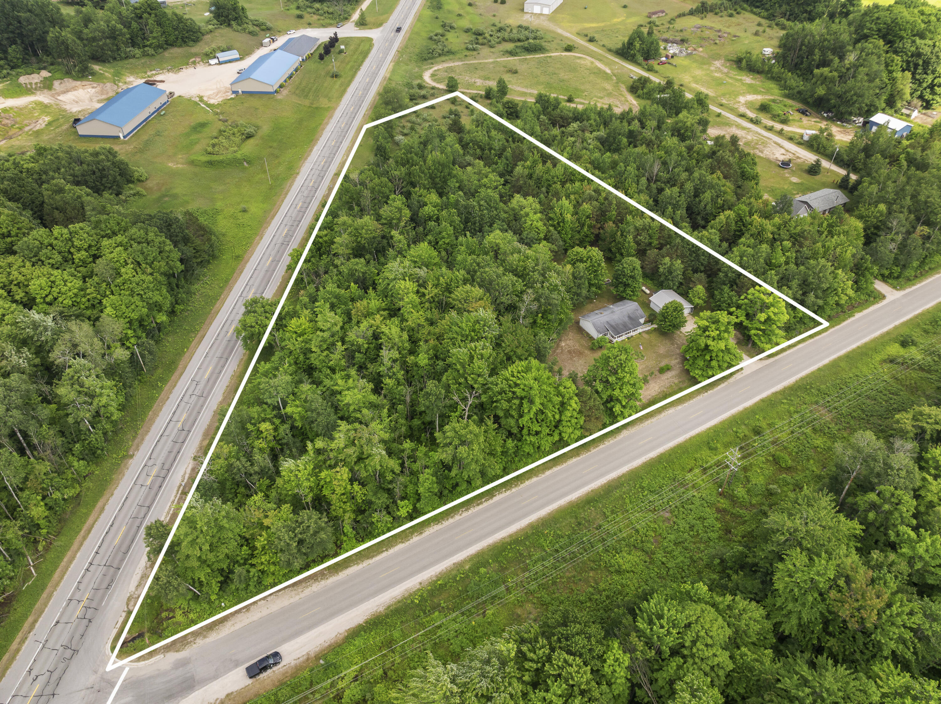 3839 Wallaker Road Benzonia, MI 49616 - Photo 37 of 37 DJI_20260629164658_0008_D