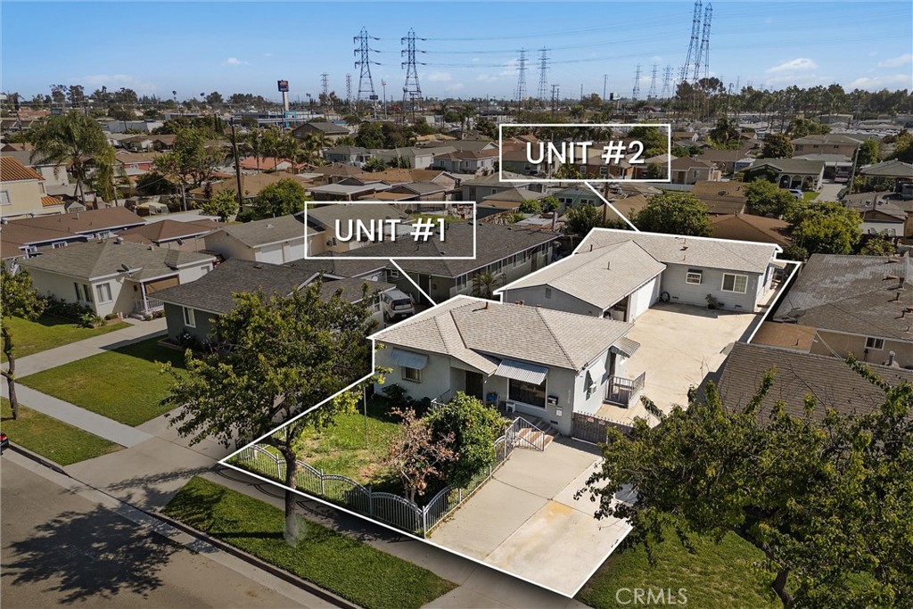 8728 Flower Street Bellflower, CA 90706 - Photo 1 of 1 an aerial view of a house with a garden