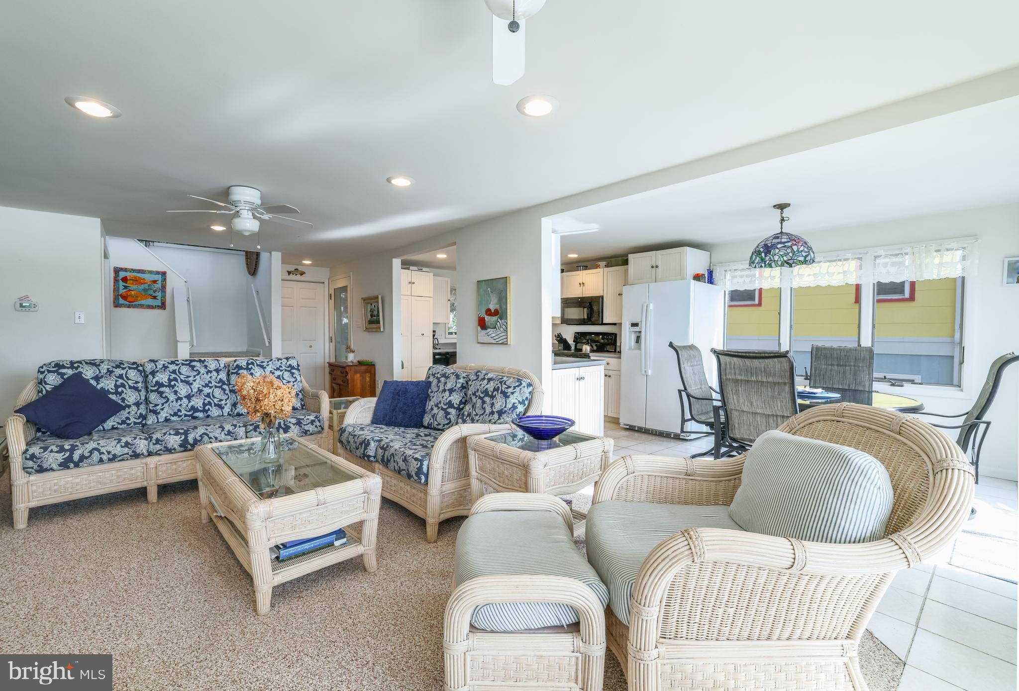 24 Maiden Lane Harvey Cedars, NJ 08008 - Photo 15 of 37 a living room with furniture and kitchen view