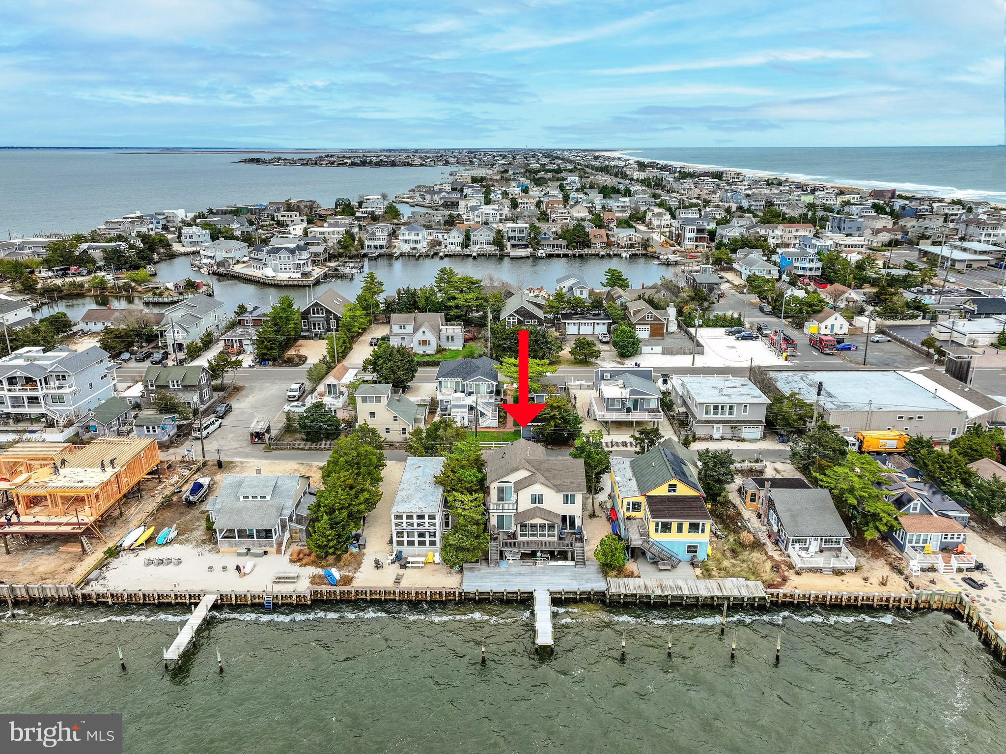 24 Maiden Lane Harvey Cedars, NJ 08008 - Photo 2 of 37 an aerial view of residential building and ocean