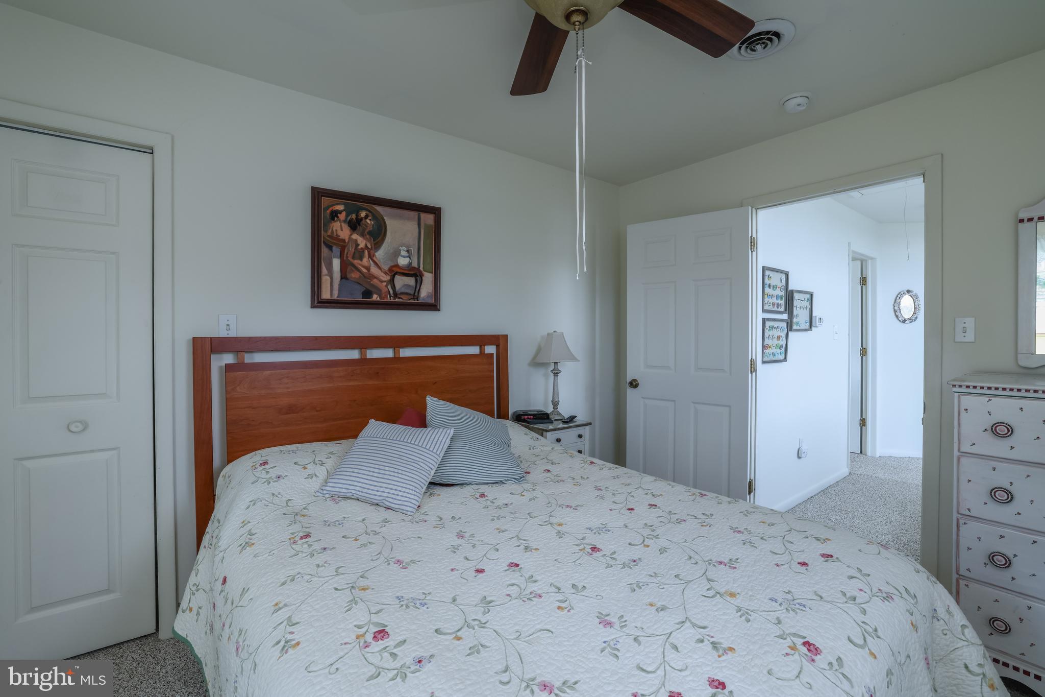 24 Maiden Lane Harvey Cedars, NJ 08008 - Photo 23 of 37 a bedroom with a bed and a view of bathroom