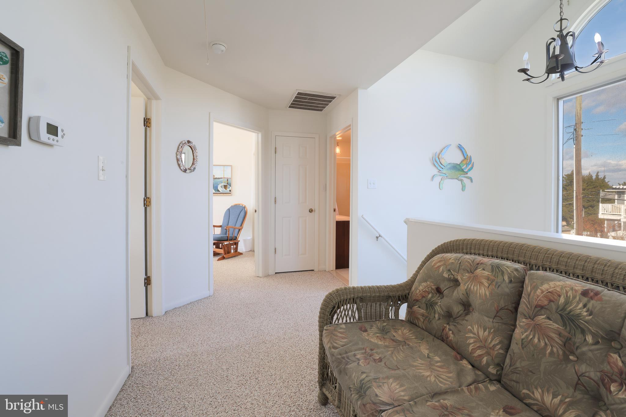 24 Maiden Lane Harvey Cedars, NJ 08008 - Photo 24 of 37 a living room with furniture