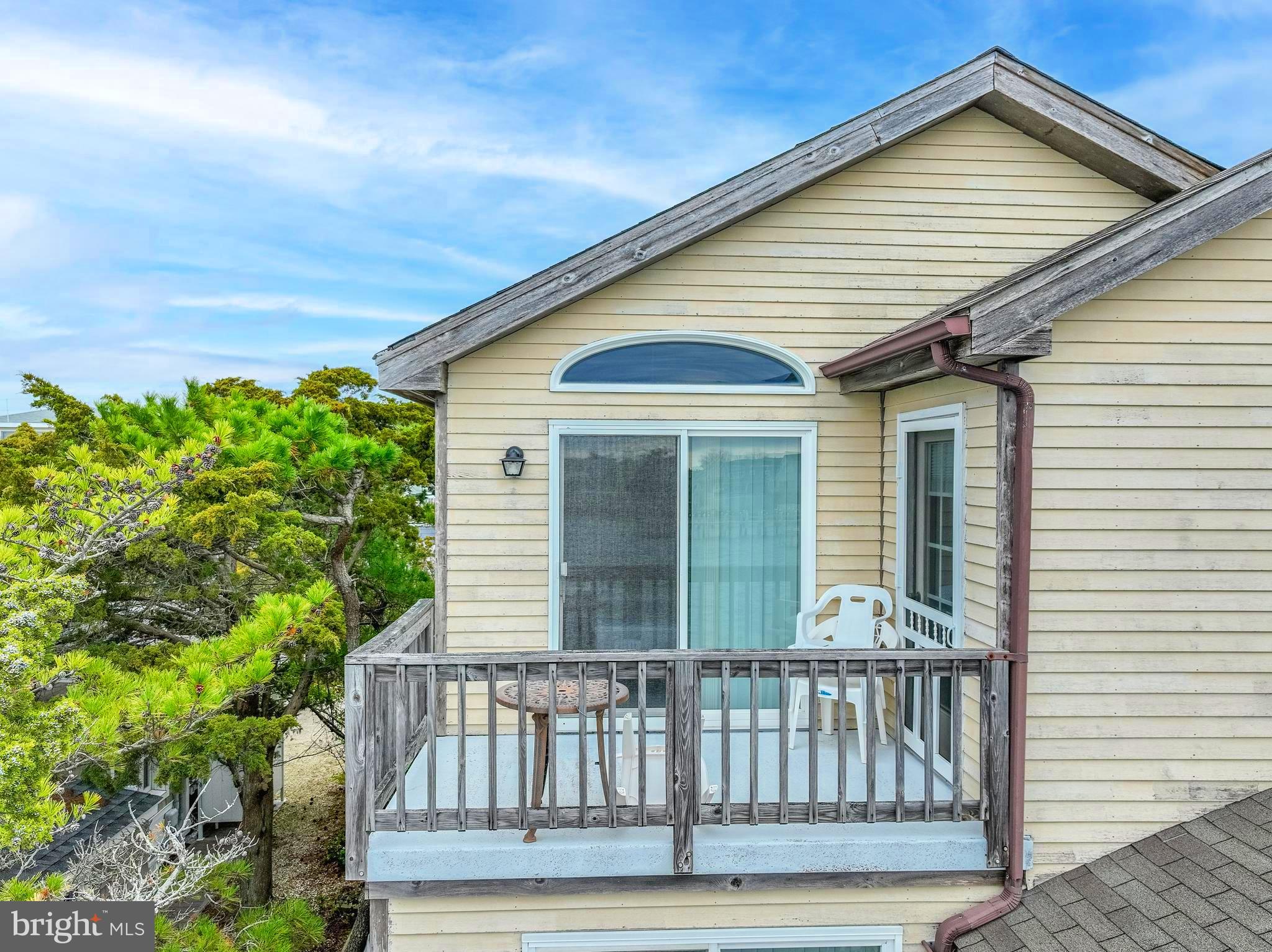 24 Maiden Lane Harvey Cedars, NJ 08008 - Photo 28 of 37 a view of porch with a yard