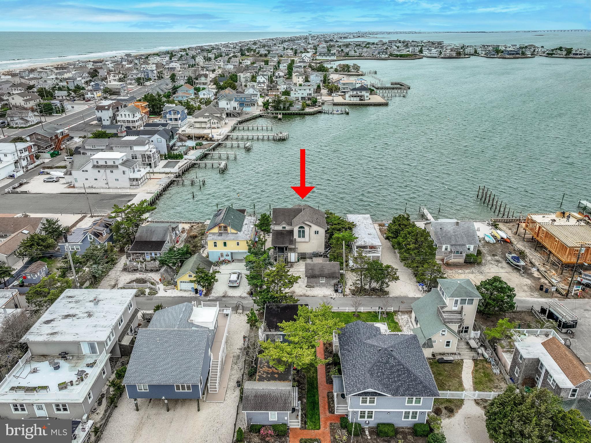 24 Maiden Lane Harvey Cedars, NJ 08008 - Photo 33 of 37 an aerial view of a city with houses