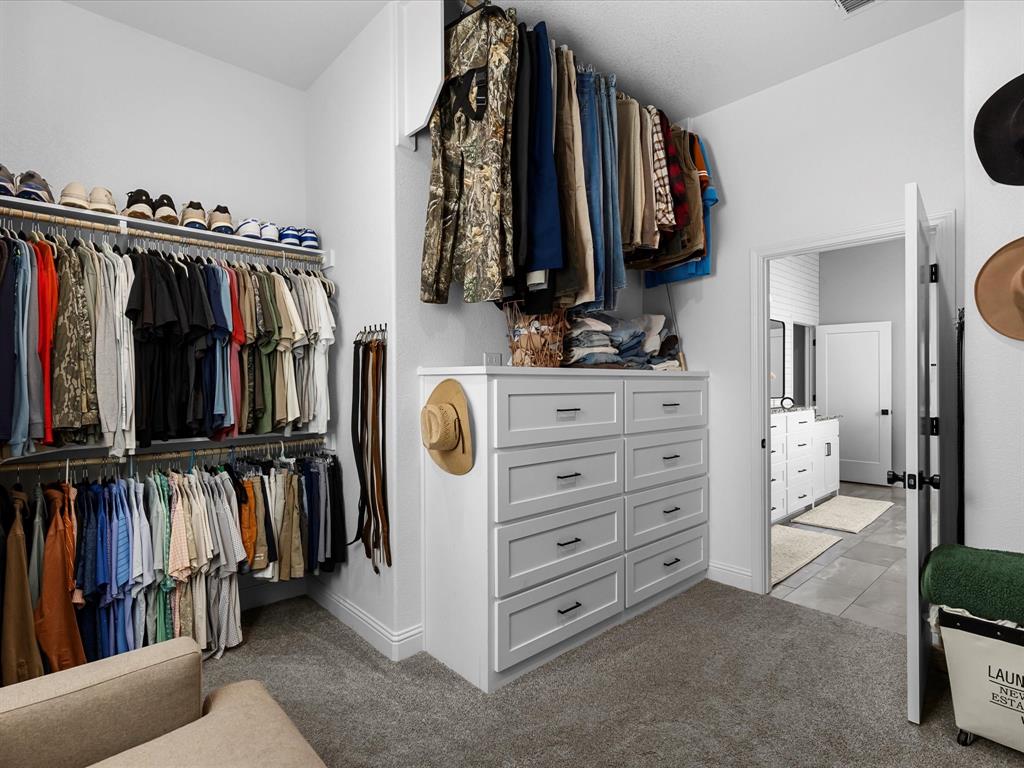 170 Proctor Lane Decatur, TX 76234 - Photo 21 of 34 Walk-in closet main bedroom