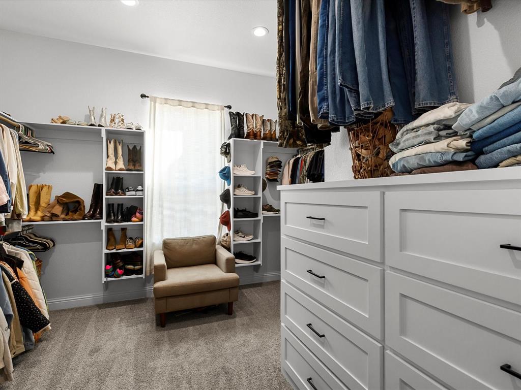 170 Proctor Lane Decatur, TX 76234 - Photo 22 of 34 Walk-in closet main bedroom