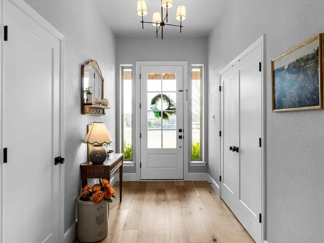 workspace with wooden floor and windows