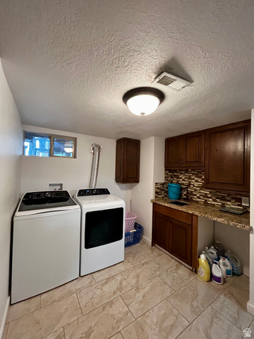 1931 Harrison Boulevard Ogden, UT 84401 - Photo 13 of 21 Dedicated laundry area featuring tile flooring, dark wood cabinetry, a built-in sink, tiled backsplash, and recessed lighting