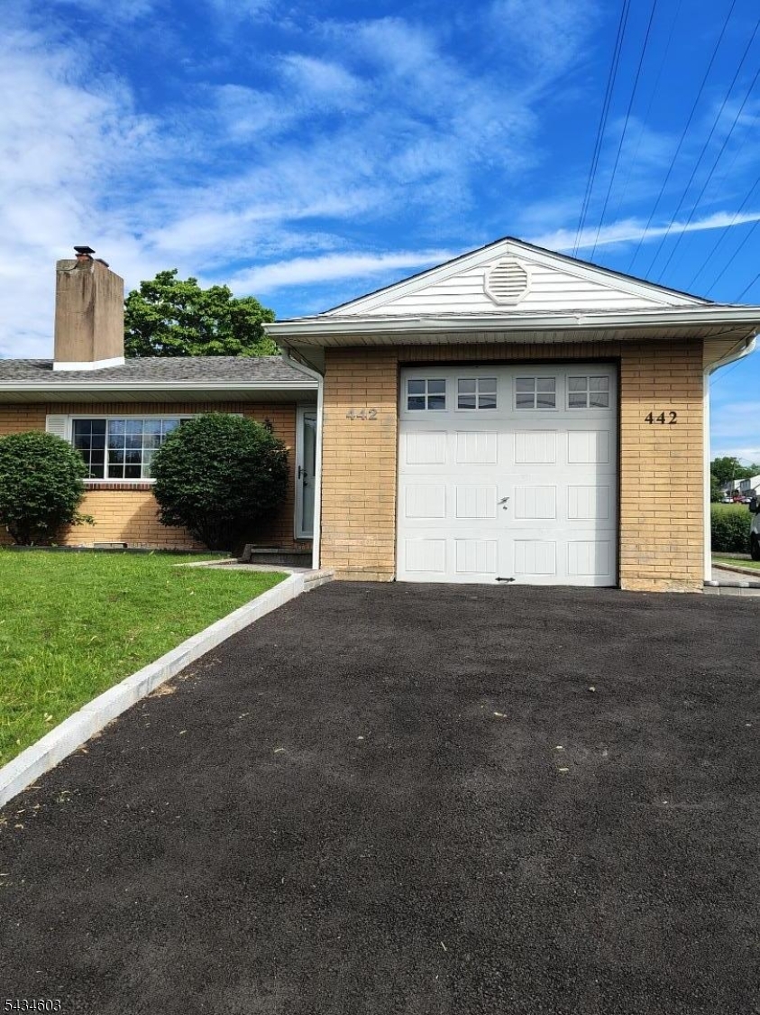 442 River Road North Arlington, NJ 07031 - Photo 15 of 26 a front view of a house with a yard