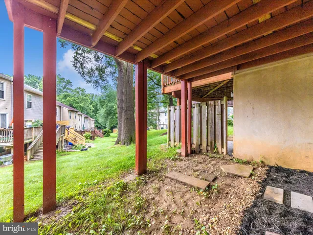 a view of a chairs and tables in the backyard