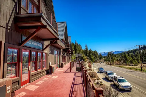 a view of a chairs and tables in patio