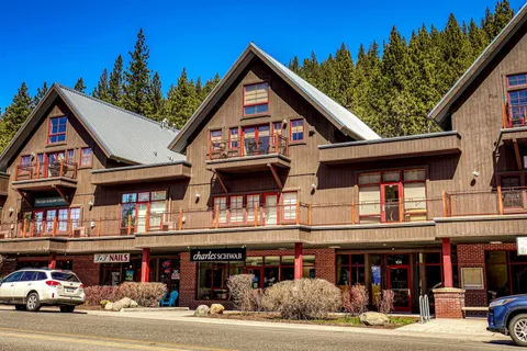 a view of a food mall next to a road