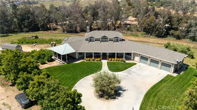 a view of a house with a swimming pool