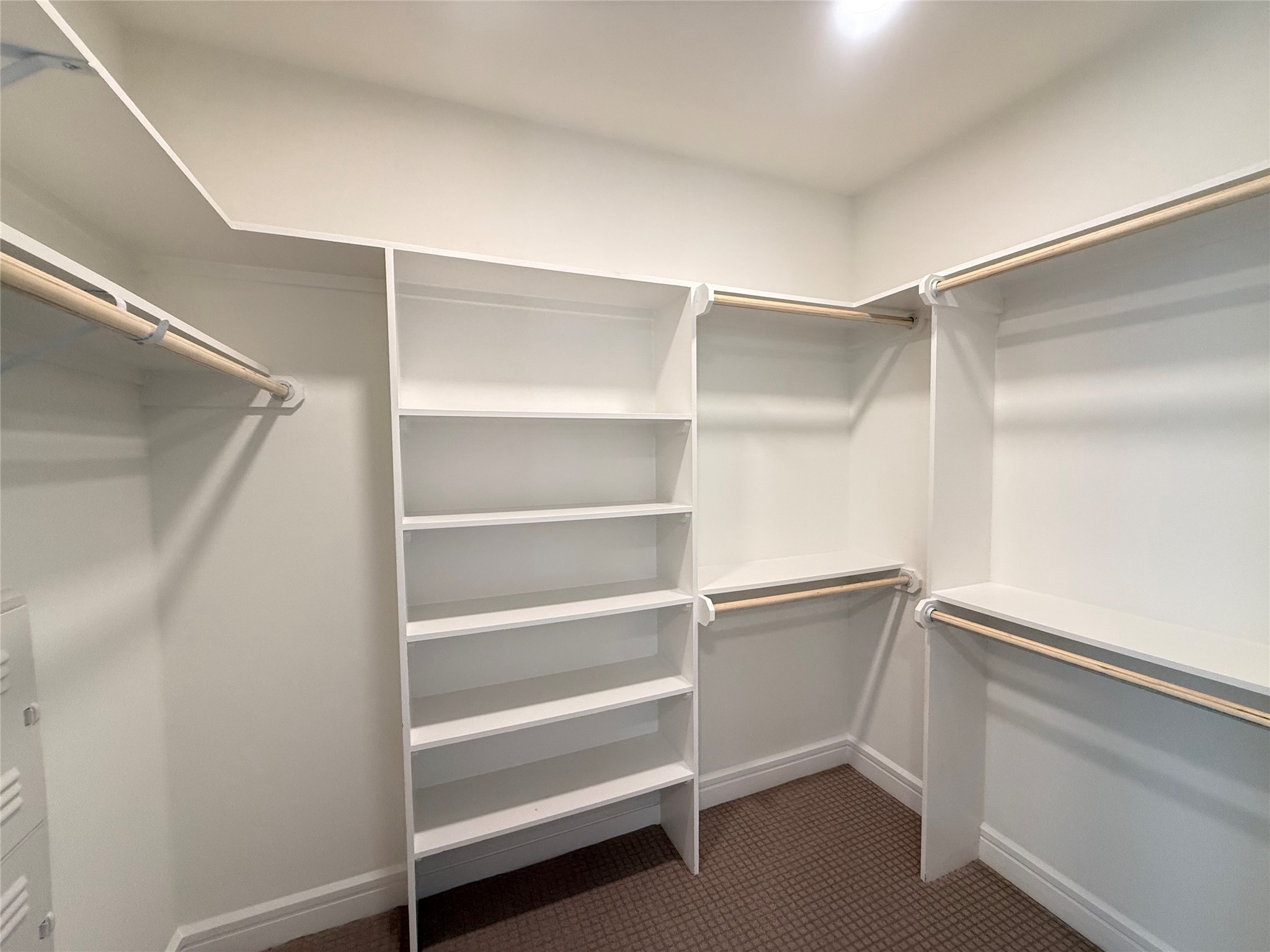 3300 Main Street, Unit B1 1105 Houston, TX 77002 - Photo 7 of 13 a view of walk in closet with empty racks