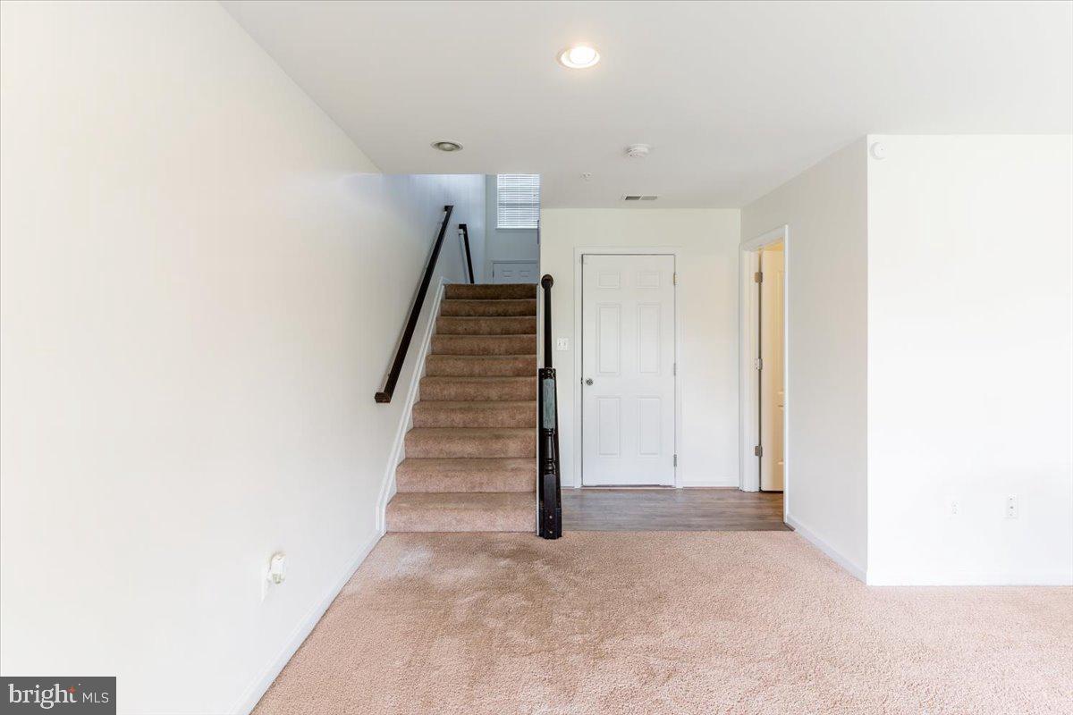 5327 Rockingham Place, Unit 75 White Plains, MD 20695 - Photo 17 of 21 lower level, garage access