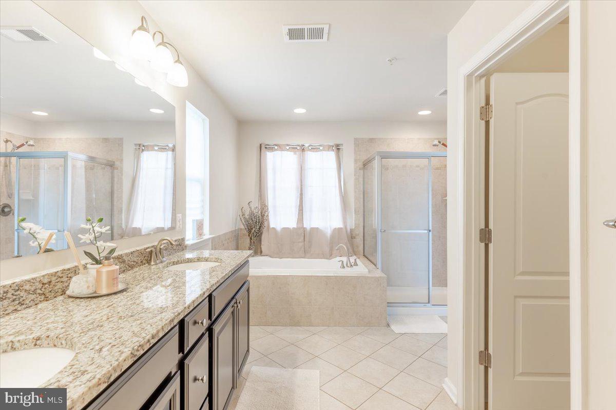 5327 Rockingham Place, Unit 75 White Plains, MD 20695 - Photo 8 of 21 Primary Suite Bathroom