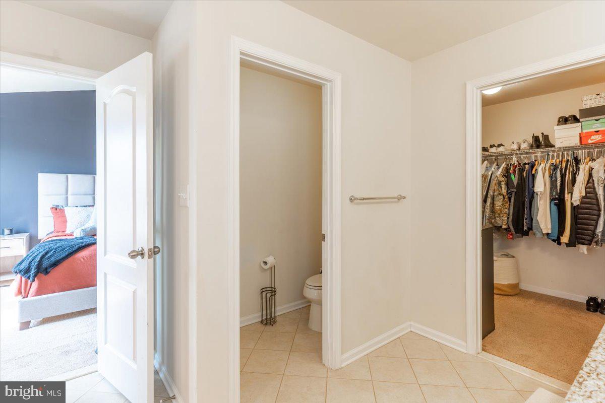 5327 Rockingham Place, Unit 75 White Plains, MD 20695 - Photo 9 of 21 Walk in closet off primary suite bathroom