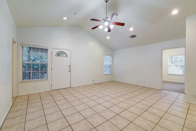 a view of an empty room and window