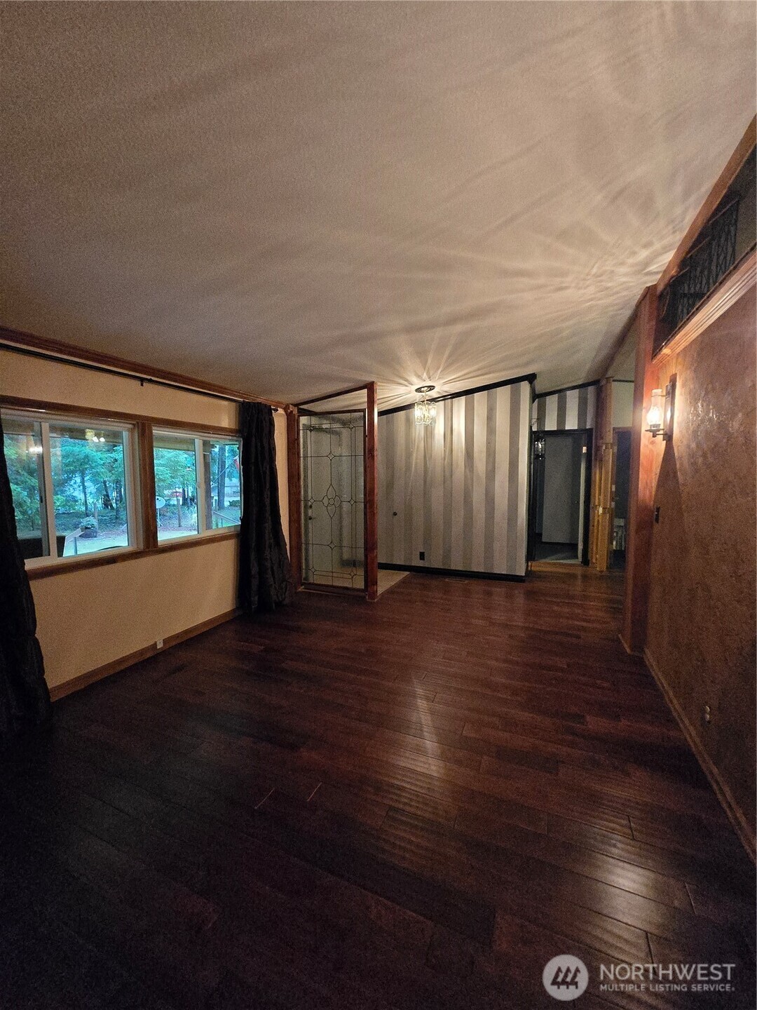 313 Minkler Road Winlock, WA 98596 - Photo 15 of 40 wooden floor in an empty room with a window