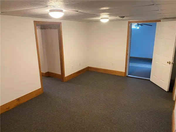 a view of a room with a hallway