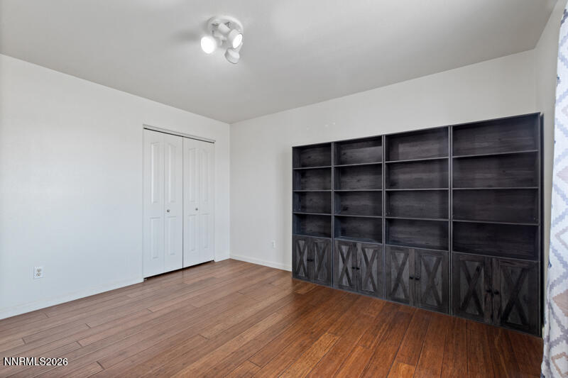 1060 Penelope Drive Fallon, NV 89406 - Photo 17 of 32 a view of wooden floor and windows in a room