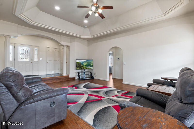 1060 Penelope Drive Fallon, NV 89406 - Photo 5 of 32 a living room with furniture and a chandelier