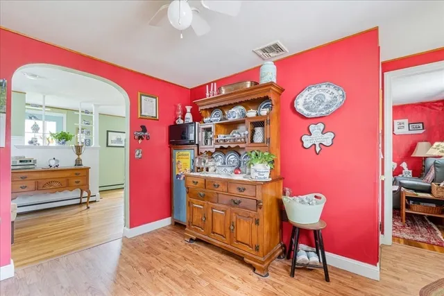 a view of room with furniture and a chandelier