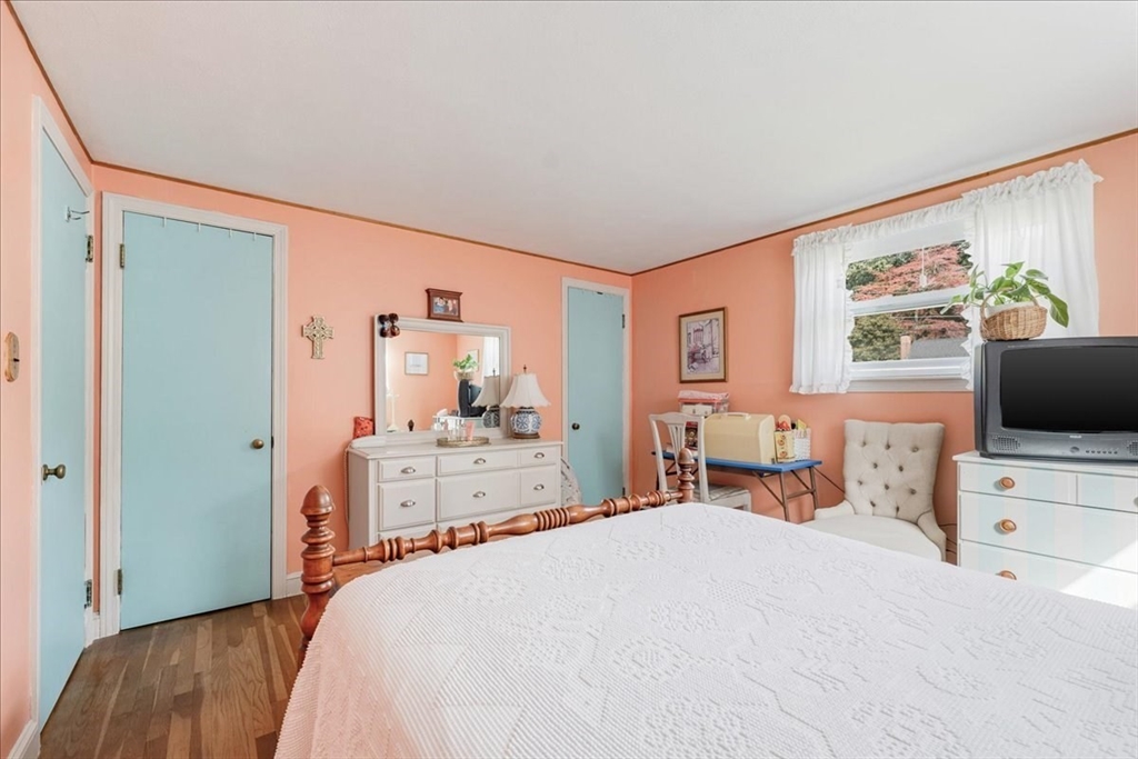 47 Beech Road Avon, MA 02322 - Photo 16 of 28 a bedroom with a bed and a flat screen tv