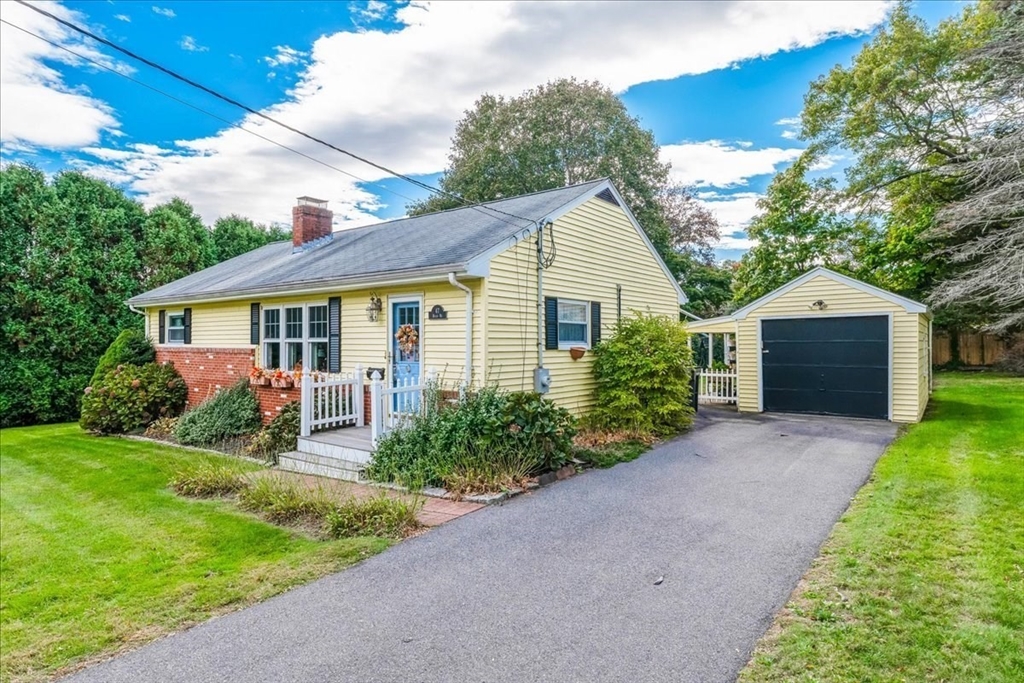 47 Beech Road Avon, MA 02322 - Photo 2 of 28 a front view of house with yard and green space