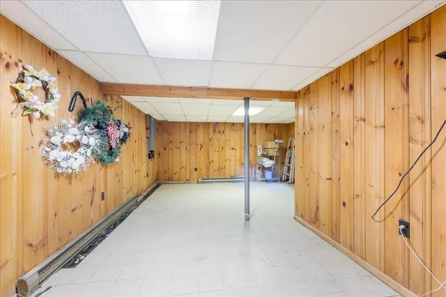 a view of a storage room with racks on the wall