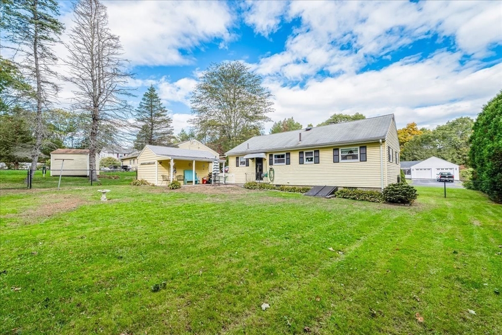 47 Beech Road Avon, MA 02322 - Photo 25 of 28 a view of a house with a yard