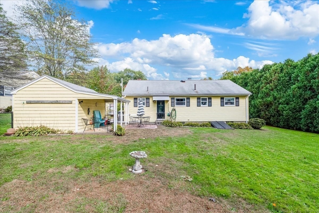 47 Beech Road Avon, MA 02322 - Photo 26 of 28 a view of a house with backyard and sitting area