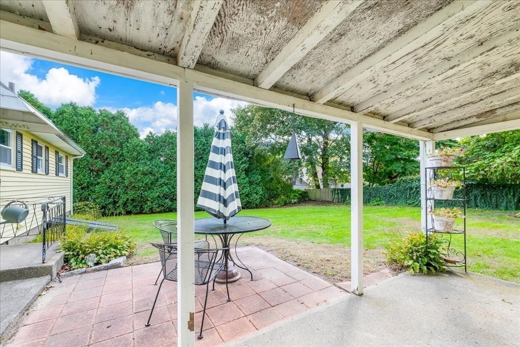 47 Beech Road Avon, MA 02322 - Photo 28 of 28 a view of a porch with furniture and garden