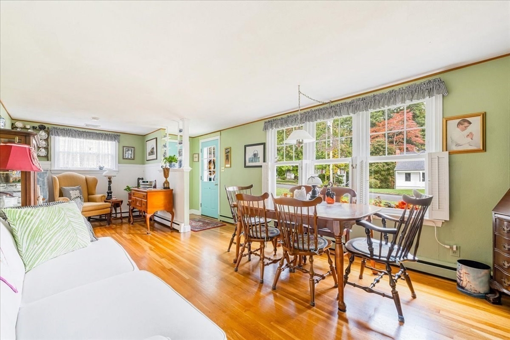 47 Beech Road Avon, MA 02322 - Photo 5 of 28 a view of a dining room with furniture window and outside view