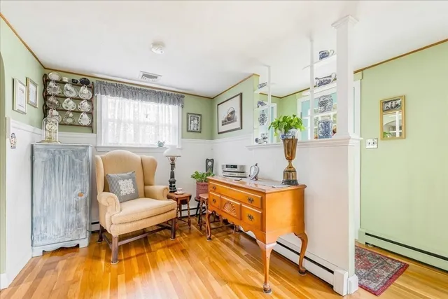 a living room with furniture and a table