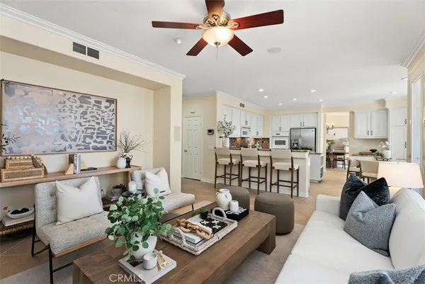 a living room with furniture and decor