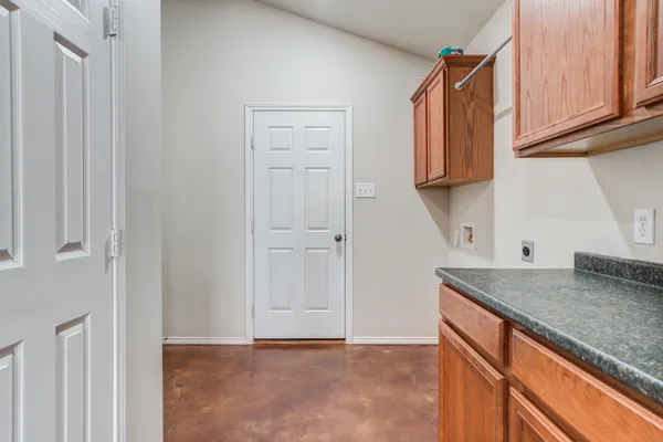 a kitchen with granite countertop a sink and a granite counter tops