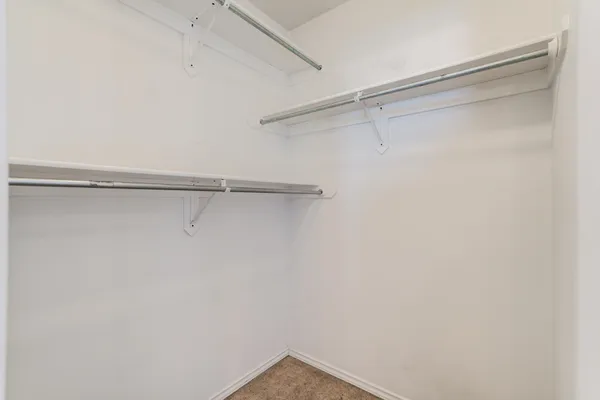 a view of a room with racks on the wall