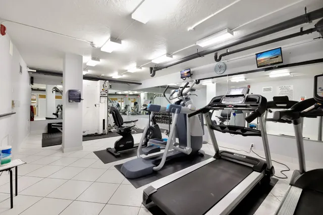 a view of a room with gym equipment