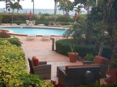 a view of balcony with furniture