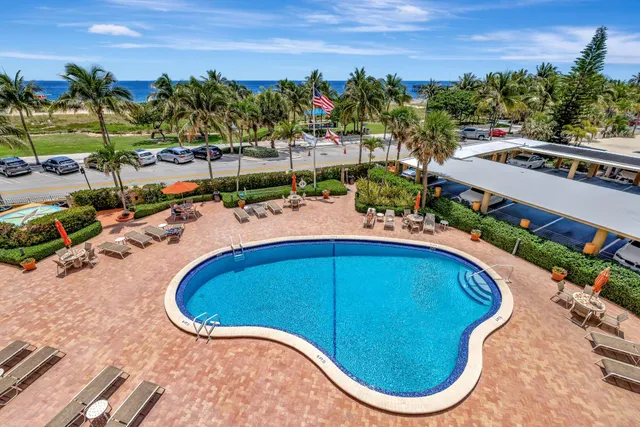 a room with gym equipment and large window