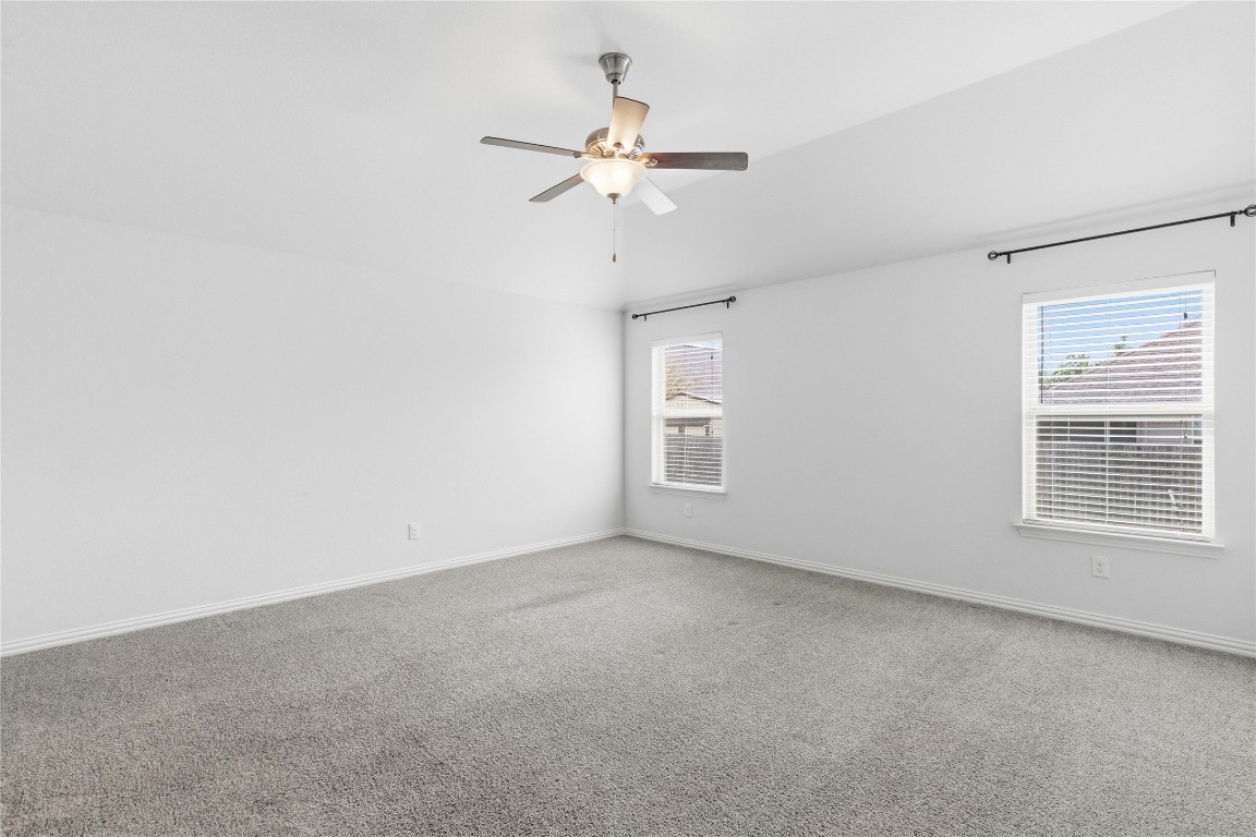 22020 Abigail Way Pflugerville, TX 78660 - Photo 13 of 25 a view of an empty room with a window