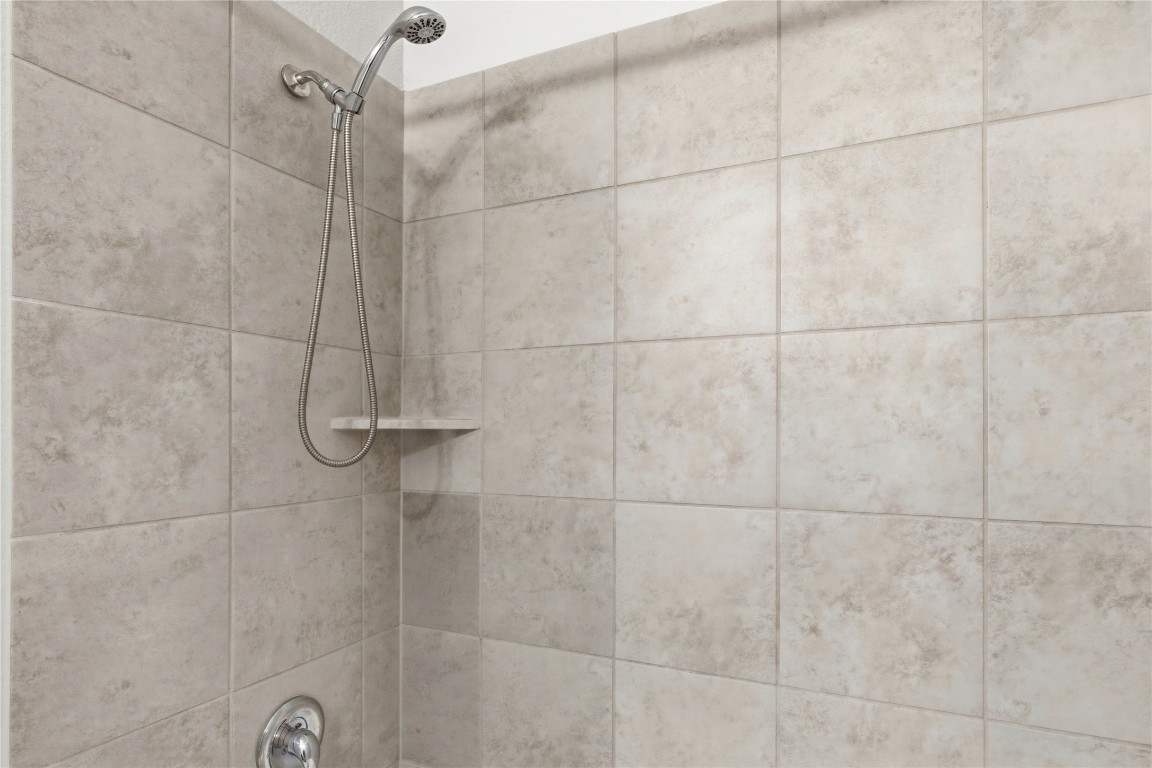 22020 Abigail Way Pflugerville, TX 78660 - Photo 20 of 25 a bathroom with a shower