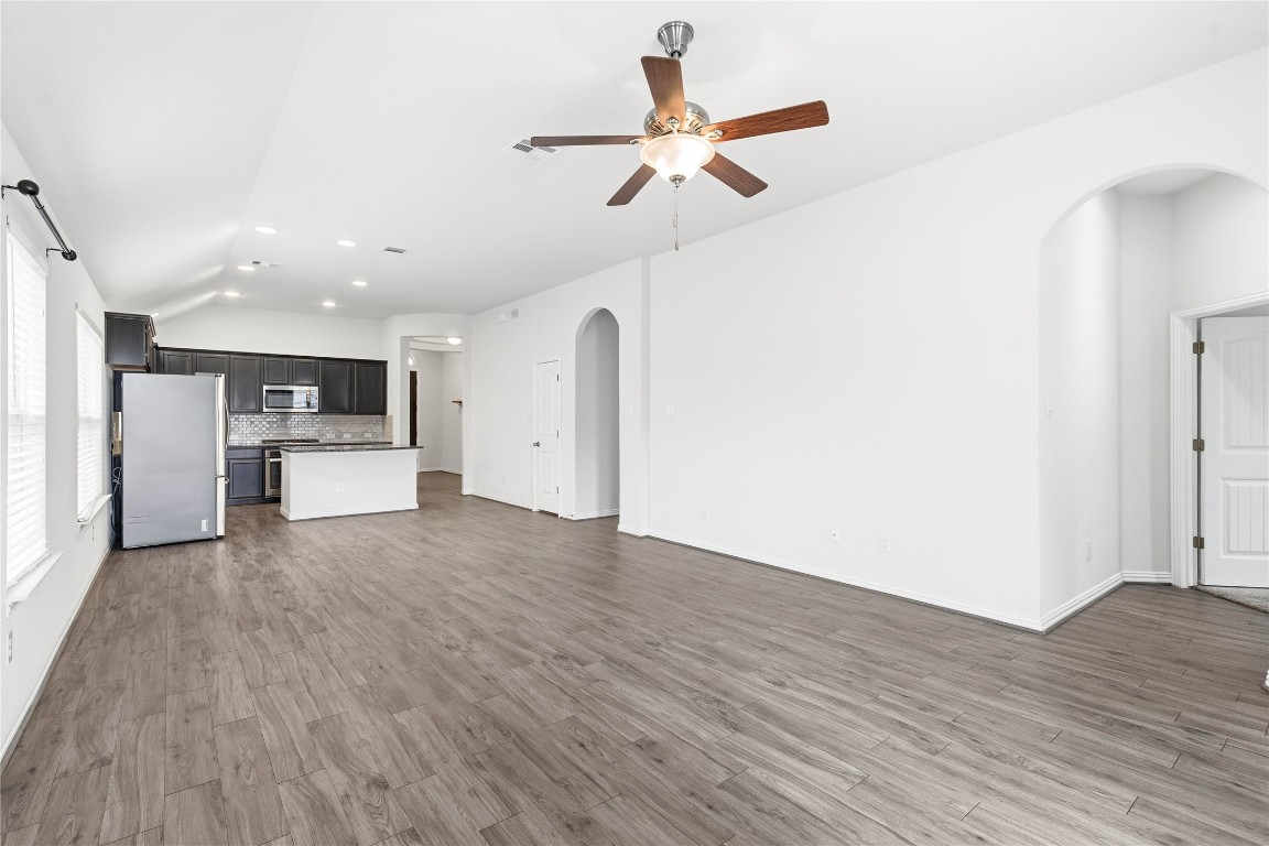 22020 Abigail Way Pflugerville, TX 78660 - Photo 10 of 25 a view of empty room with wooden floor and window