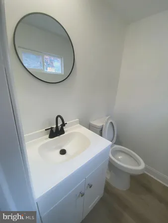 a bathroom with a toilet and a sink