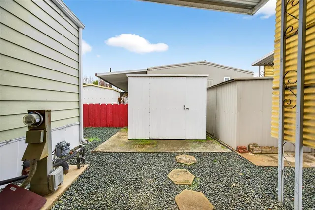 a view of a back yard of the house