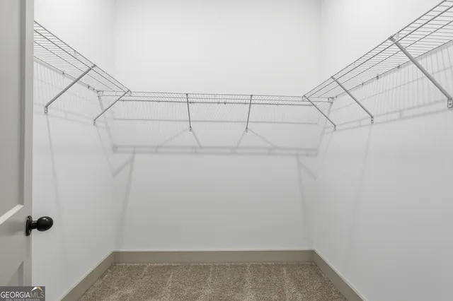 a view of a room with racks on the wall