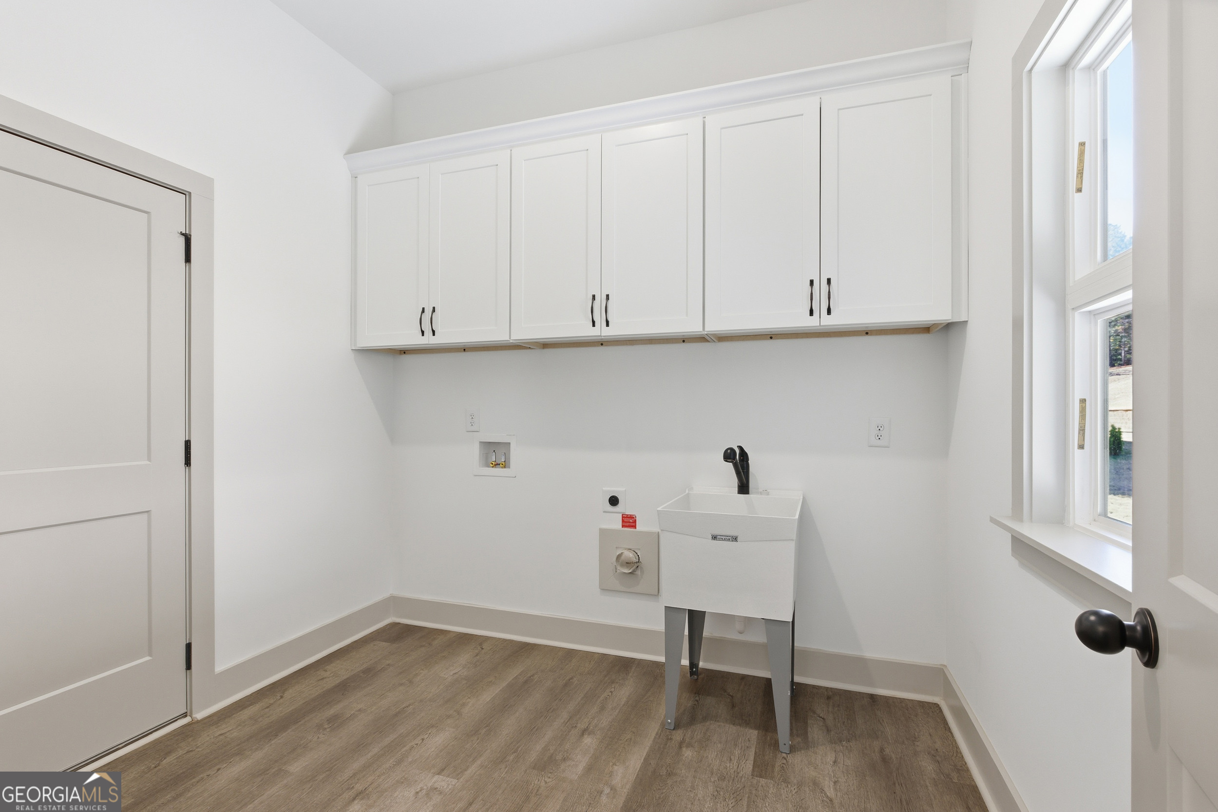 297 Ayers Creek Drive Toccoa, GA 30577 - Photo 30 of 51 a view of an empty room and wooden floor