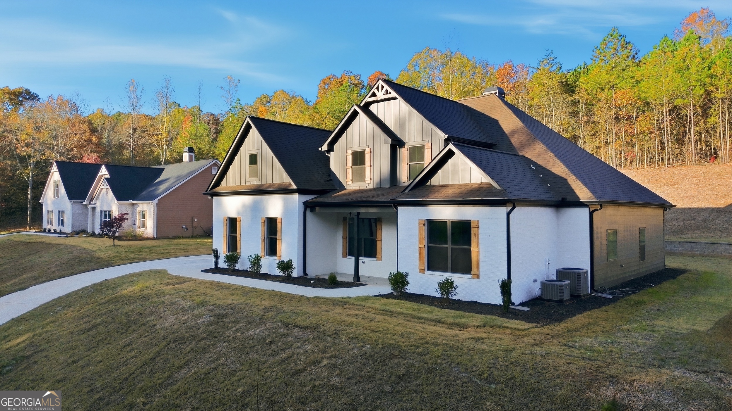 297 Ayers Creek Drive Toccoa, GA 30577 - Photo 3 of 51 a front view of a house with a yard