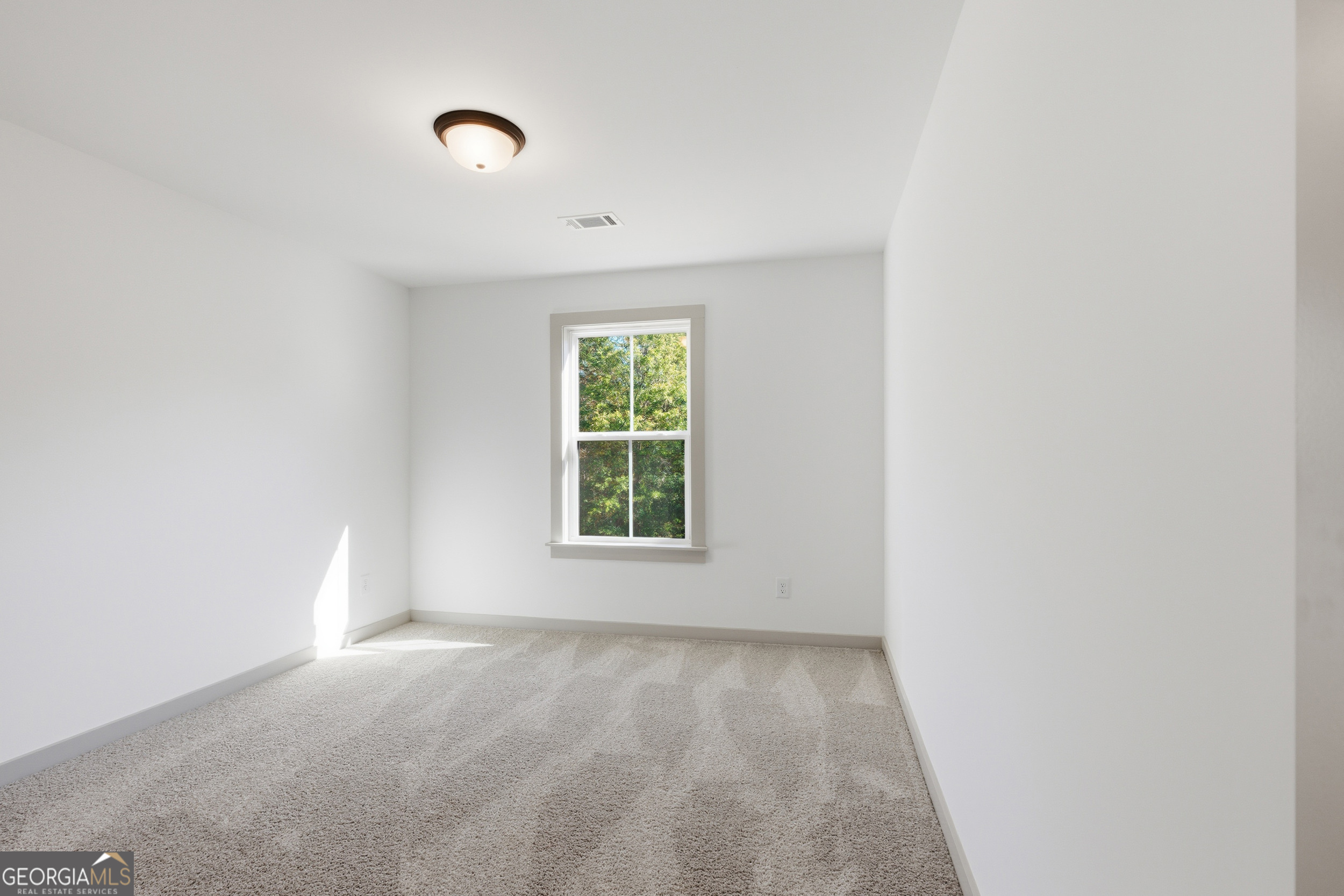 297 Ayers Creek Drive Toccoa, GA 30577 - Photo 34 of 51 an empty room with a window